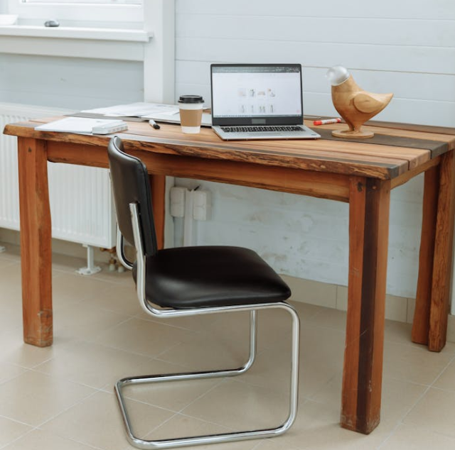 Digital scene representing website design near me Desk with laptop and chair. Representing a start up website design agency in beaconsfield, near fremantle.